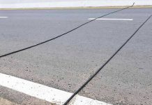 SPOTTED BLACK CABLES ON THE ROAD? HERE’S WHAT THEY ACTUALLY DO (AND WHAT YOU SHOULD NEVER DO)