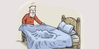 A WOMAN SNEAKS UNDERNEATH THE BED TO SPY ON HER HUSBAND.