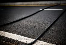 SPOTTED BLACK CABLES ON THE ROAD? HERE’S WHAT THEY ACTUALLY DO (AND WHAT YOU SHOULD NEVER DO)