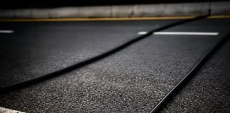 SPOTTED BLACK CABLES ON THE ROAD? HERE’S WHAT THEY ACTUALLY DO (AND WHAT YOU SHOULD NEVER DO)